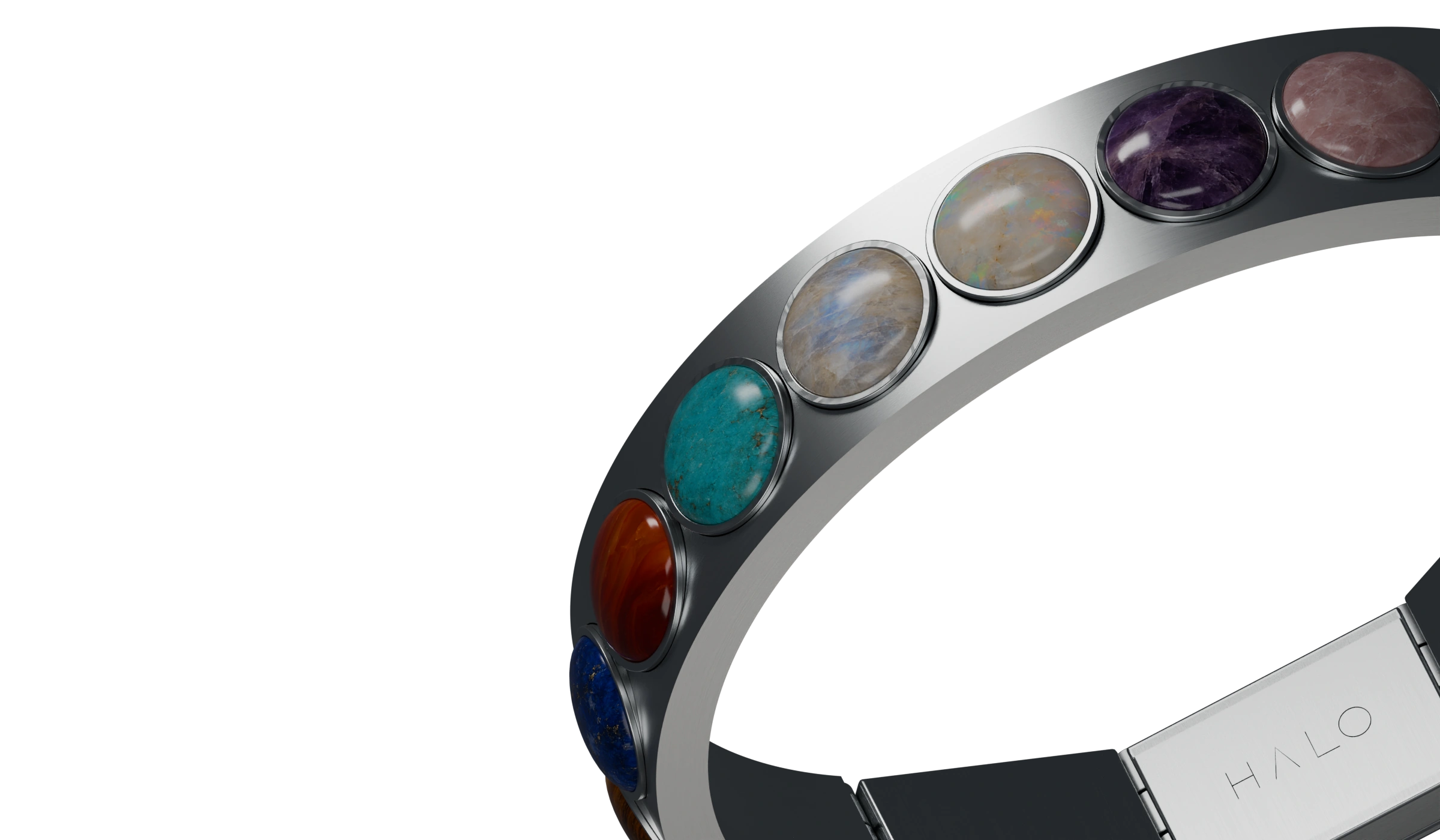 Close detail of Halo’s brushed silver bracelet and natural milestone stones.